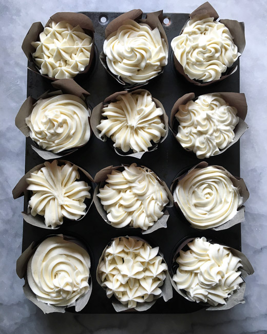 https://zoebakes.com/wp-content/uploads/2008/01/Devils-Food-Cupcakes-with-Cream-Cheese-Icing-ZoeBakes-1-of-3.jpg